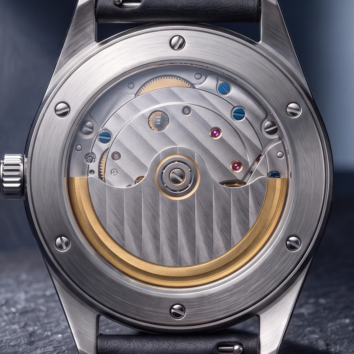 The back of the Morrowfield watch: a brushed steel ring on six screws, the winding rotor hanging down behind the glass