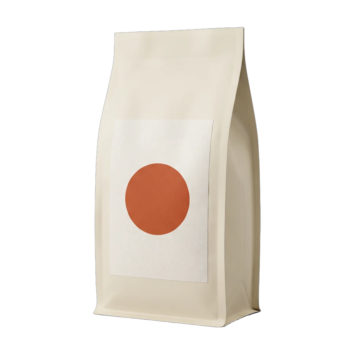 A cream bag of coffee with a terracotta disc on its label